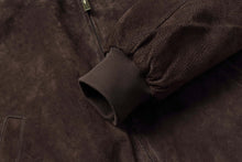 Load image into Gallery viewer, Close-up of REED Men&#39;s Baseball Suede Leather Jacket sleeve, showcasing the durable imported suede and ribbed cuff detail.
