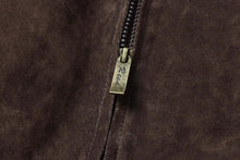 Load image into Gallery viewer, Close-up of zipper detail on REED men&#39;s baseball suede leather jacket, showcasing soft texture.
