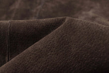 Load image into Gallery viewer, Close-up of brown suede leather texture, highlighting softness and quality.
