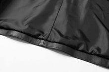 Load image into Gallery viewer, Close-up of the inside lining of a REED Men&#39;s Lambskin Leather Blazer, showcasing premium quality craftsmanship and durable soft-touch materials.
