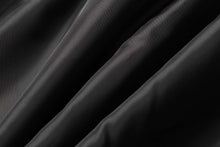 Load image into Gallery viewer, Smooth black fabric texture, close-up showing folds and luxurious sheen.

