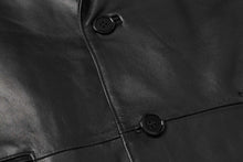 Load image into Gallery viewer, Close-up of REED Men&#39;s Lambskin Leather Blazer showcasing soft, durable leather texture and classic button design.
