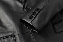 Load image into Gallery viewer, Close-up of REED Men&#39;s Premium Lambskin Leather Blazer, showcasing sleek button detailing and soft durable leather texture.
