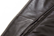 Load image into Gallery viewer, Close-up of the REED Men&#39;s New Zealand Lambskin Leather Jacket zip detail in black
