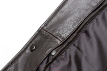 Load image into Gallery viewer, Close-up of inside collar and button detail on REED EST. 1950 Men&#39;s Genuine Lambskin Leather Jacket, displaying rich texture and quality.
