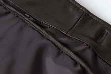 Load image into Gallery viewer, Close-up of the interior lining and zipper of a REED EST. 1950 men&#39;s lambskin leather jacket, showcasing craftsmanship details.

