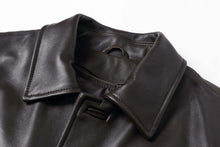 Load image into Gallery viewer, REED EST. 1950 men&#39;s genuine lambskin leather car coat with four button closure, close-up of collar detail.
