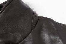 Load image into Gallery viewer, Close-up of REED EST. 1950 men&#39;s jacket showing premium lambskin leather texture and stitching detail.
