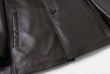 Load image into Gallery viewer, Close-up of REED EST. 1950 men&#39;s genuine lambskin leather jacket, featuring four-button design and soft, premium quality material.
