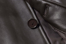 Load image into Gallery viewer, Close-up of a button and leather texture on the REED EST. 1950 Men&#39;s Genuine Lambskin Leather Jacket
