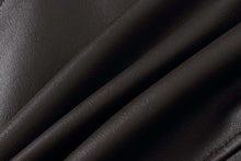 Load image into Gallery viewer, Close-up of genuine lambskin leather texture in dark brown, highlighting the soft and premium quality material used in REED&#39;s men&#39;s jackets.
