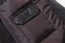 Load image into Gallery viewer, Close-up of REED Men&#39;s Premium Leather Aviator Bomber Jacket interior pocket, highlighting durable stitching and soft lining.
