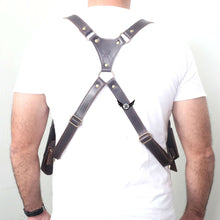 Load image into Gallery viewer, Cowhide Leather Vertical Concealed Holster Right and Left Handers Universal Size shown on a person from the back view.

