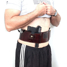 Load image into Gallery viewer, Cowhide Leather BRAVOBELT Belly Band Holster for Concealed Carry - Ambidextrous shown on a person wearing casual clothing.
