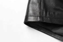 Load image into Gallery viewer, Close-up of REED genuine lambskin leather men&#39;s jacket showing premium quality and luxurious softness.
