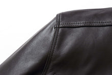Load image into Gallery viewer, Close-up of REED Men&#39;s Lambskin Leather Jacket with Stand-Up Collar, showcasing premium stitching and texture.
