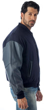 Load image into Gallery viewer, REED Men&#39;s Premium Varsity Leather/Wool Jacket, stylish and warm, made in USA, shown worn by a model, highlighting quality craftsmanship.
