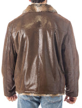 Cargar imagen en el visor de la galería, Brown leather jacket with fur collar on a white background
