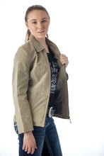 Load image into Gallery viewer, Woman modeling REED women&#39;s genuine suede leather jacket, featuring satin lining and stylish design, perfect for a fashionable look.
