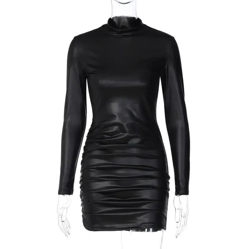 Black faux leather ruched mini dress with long sleeves, sleek design for edgy elegance and sophisticated style.