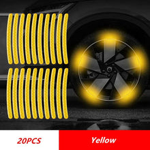 Load image into Gallery viewer, Yellow reflective tape for car wheels, 20 pieces. Enhances visibility and safety, shown applied to a car wheel hub.
