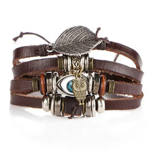 Load image into Gallery viewer, Multilayer leather bracelet with owl charm and leaf detail, stylish and durable accessory for any occasion.
