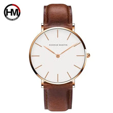 Load image into Gallery viewer, High-quality rose gold dial leather watch with minimalist design and genuine leather strap, perfect for both casual and formal wear.
