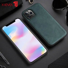 Load image into Gallery viewer, Luxury hybrid protective leather iPhone case with soft TPU frame, showcasing elegance and durability, with phone on display.
