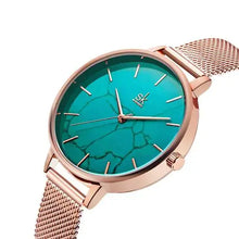 Load image into Gallery viewer, Elegant women&#39;s fashion watch with turquoise face and rose gold mesh band, perfect for elevating any outfit with sophistication and style.

