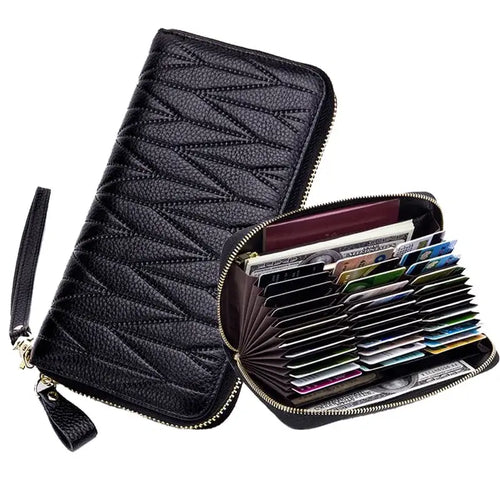 Leather female travel purse with organizer, perfect for cards and essentials, stylish and durable, ideal for chic travel needs.