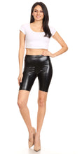 Charger l&#39;image dans la galerie, Unisex shiny metallic bike shorts, stretchy and comfortable, shown on a model, made in USA
