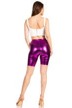 Charger l&#39;image dans la galerie, Purple shiny metallic bike shorts, stretchy unisex fit, worn by model, made in USA, featuring elastic waistband and mid-length design.
