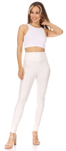 Load image into Gallery viewer, Model wearing white matte liquid high waist stretch leggings, made in USA, paired with a white crop top, showcasing a stylish casual look.
