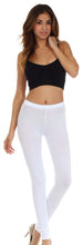 Charger l&#39;image dans la galerie, Model wearing white cotton blend footless stretch leggings, perfect for yoga, pilates, exercise, or casual wear; made in USA.
