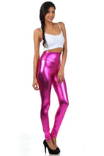 Charger l&#39;image dans la galerie, Woman wearing shiny liquid metallic high waist stretch leggings in bold pink, paired with a white crop top. Made in USA.
