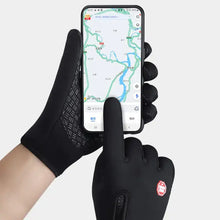 Cargar imagen en el visor de la galería, Person using a smartphone with waterproof touchscreen winter gloves, showcasing functionality and weather resistance.
