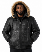 Cargar imagen en el visor de la galería, Man wearing Original Detroit High Roller Jacket by REED with unique embossed design and fur collar, showcasing style and luxury.
