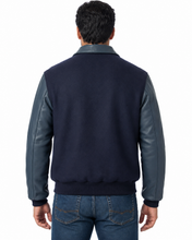 Load image into Gallery viewer, Man wearing REED leather varsity bomber jacket with wool body and leather sleeves, made in USA, classic and stylish design.
