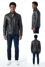 Load image into Gallery viewer, Man wearing a black leather jacket and blue jeans on a white background

