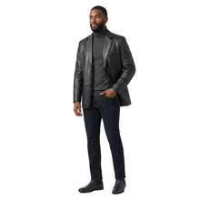 Load image into Gallery viewer, Man wearing a black leather jacket, turtleneck, and jeans on a white background
