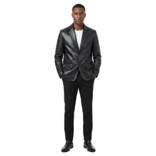 Load image into Gallery viewer, Man wearing a black suit on a white background
