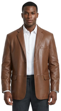 Load image into Gallery viewer, Man wearing a brown leather jacket over a white shirt on a white background
