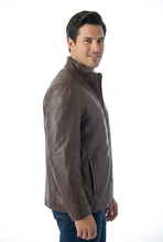 Load image into Gallery viewer, Man wearing a brown leather jacket on a white background
