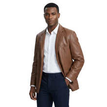 Load image into Gallery viewer, Man wearing a brown leather jacket over a white shirt and dark pants on a light gray background
