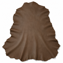 Cargar imagen en el visor de la galería, Medium Brown reed sheepskin leather hide on a white background
