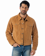 Charger l'image dans la galerie, Model wearing a camel REED Men's Western Jean Style Suede Leather Shirt Jacket, showcasing a sleek and sophisticated masculine look.
