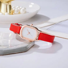 Load image into Gallery viewer, Oval Dial Retro Watch with red strap on a marble surface, showcasing its vintage-inspired elegance and unique oval face design
