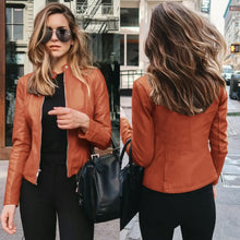 Load image into Gallery viewer, Woman wearing brown vegan leather jacket with zip-up front, styled with black pants and sunglasses, showcasing front and back views.

