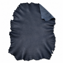 Cargar imagen en el visor de la galería, Navy reed sheepskin hides folded edge on a white background
