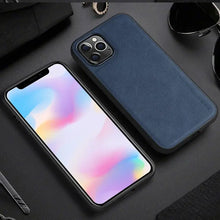 Load image into Gallery viewer, Luxury hybrid leather iPhone case, blue PU leather, durable TPU frame, stylish and protective, fits snugly over phone, elegant design.
